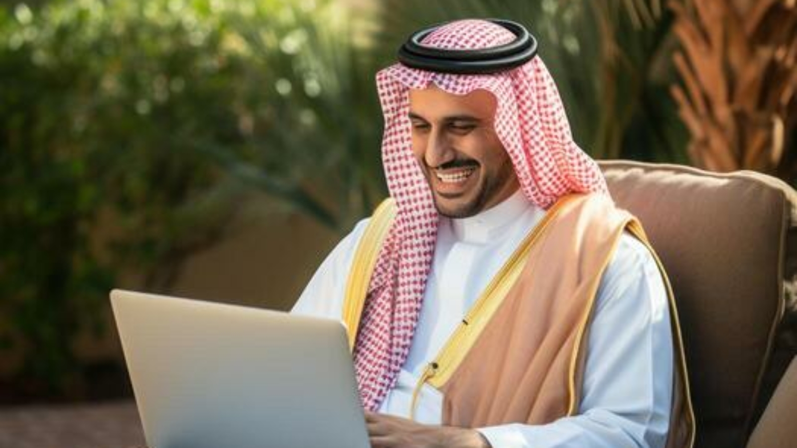 saudi-man-sitting-laptop-infront-having-an-online-meeting-generative-ai-photo